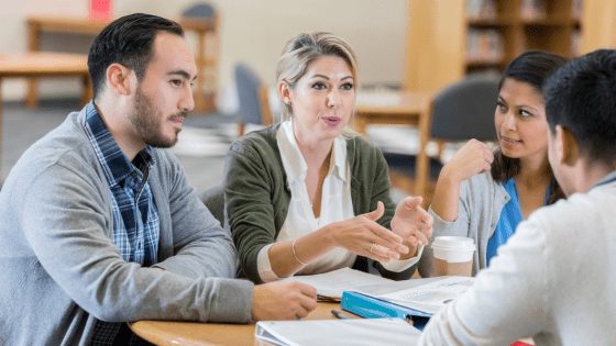 Colleagues actively listening to each members ideas.png