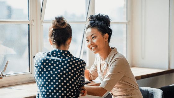 Leader actively listening to her employee's problem